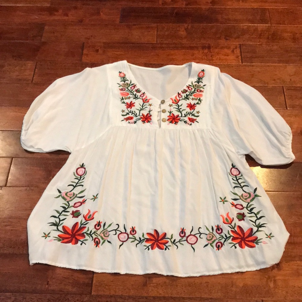 White blouse with floral pattern